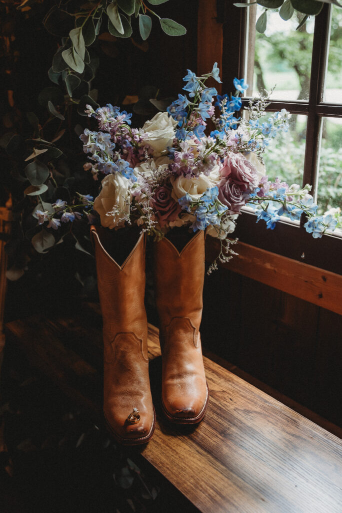 Western-inspired wedding details featuring cowboy boots