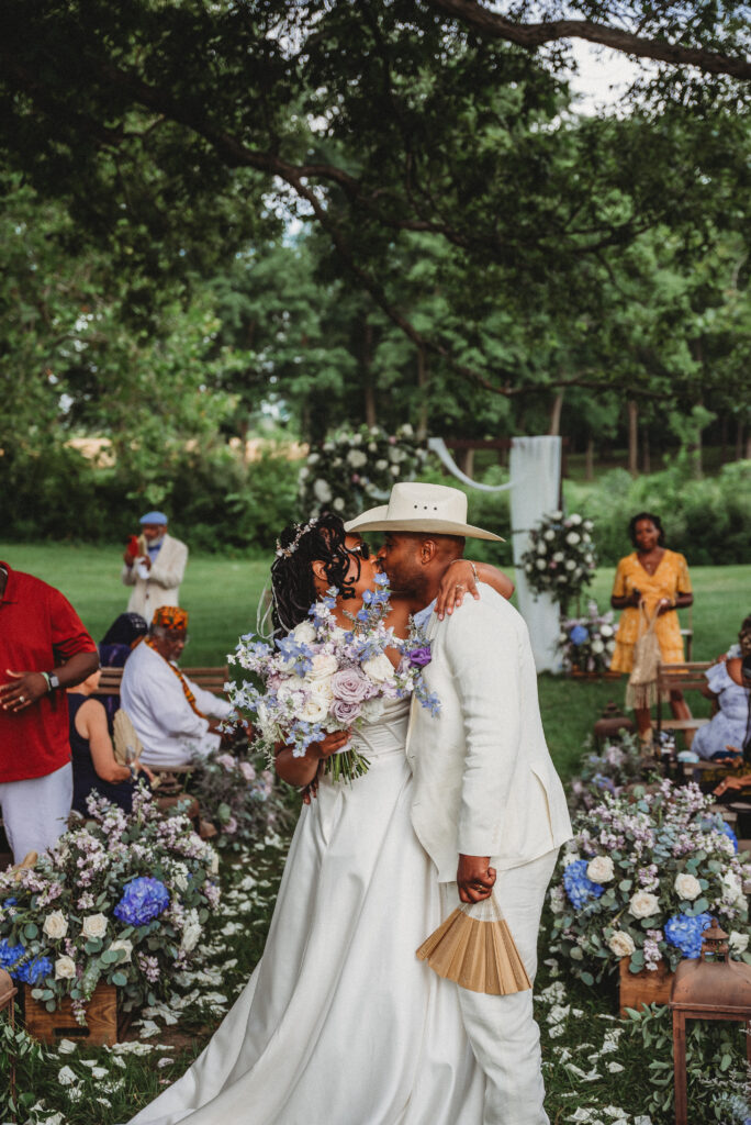 Newlyweds embracing during outdoor wedding portraits