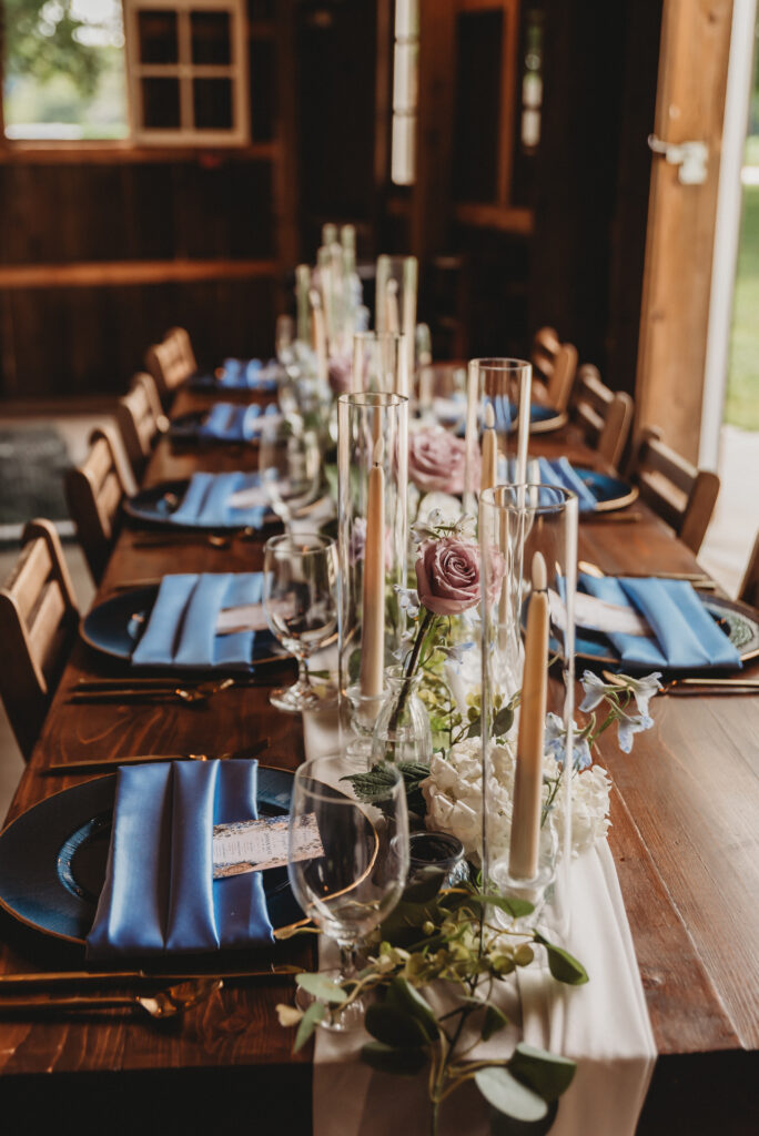 Wedding reception decorated with floral arrangements and warm lighting