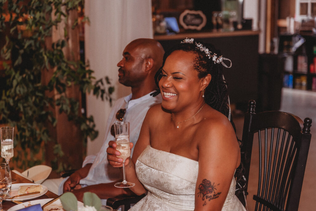 Bride and groom sharing a joyful moment after their wedding ceremony